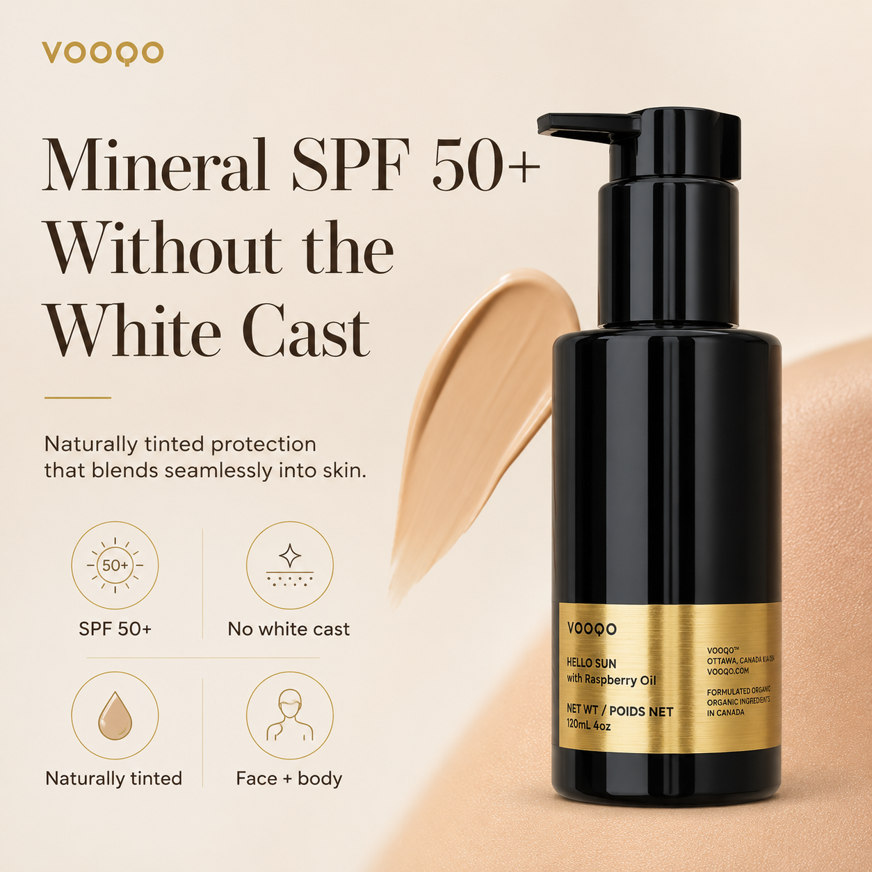 Black bottle of Vooqo sunscreen with gold label on a beige background