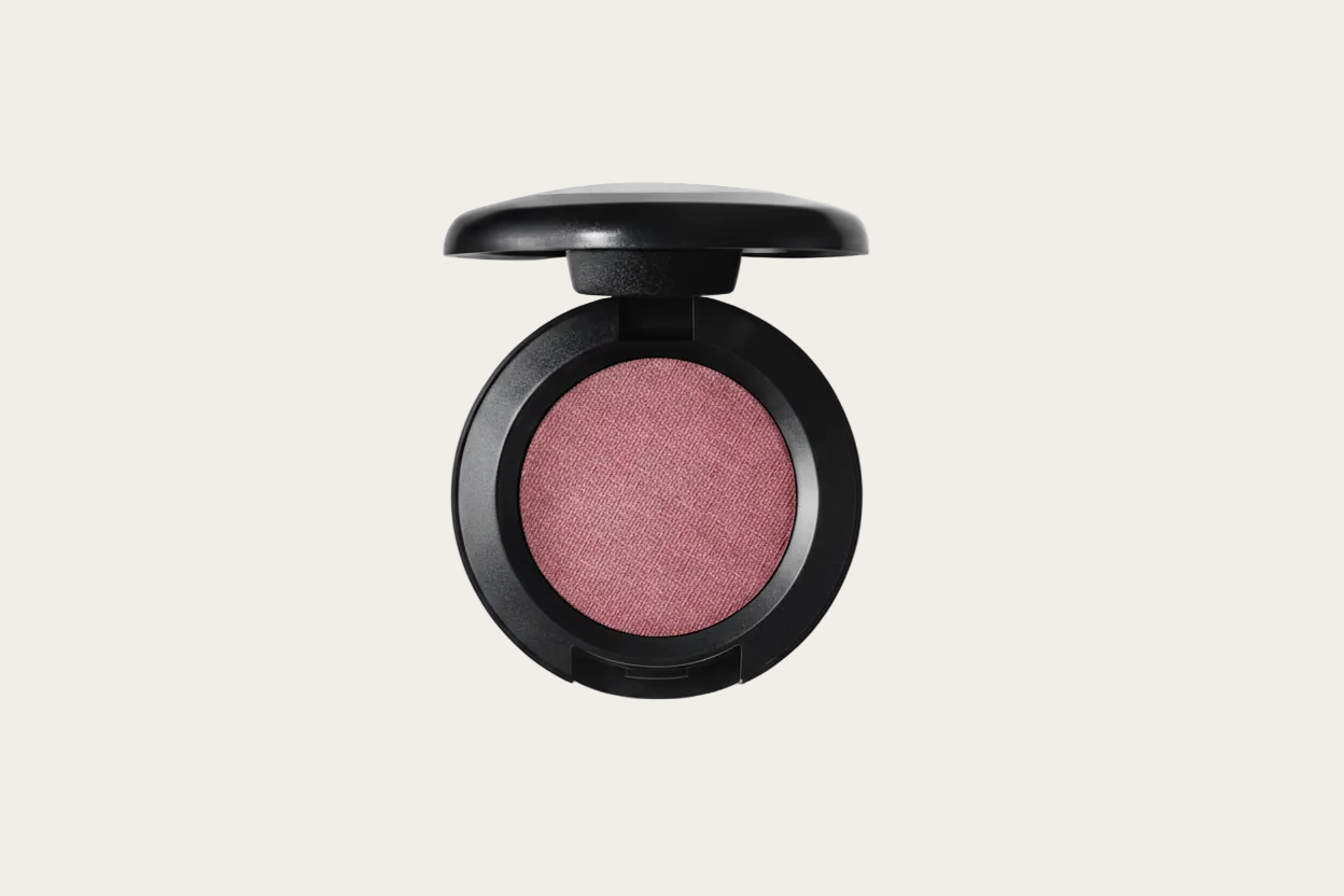 Compact blush in a black case on a transparent background