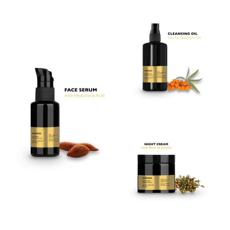 Set of skincare products including face serum, cleansing oil, and night cream on a white background.